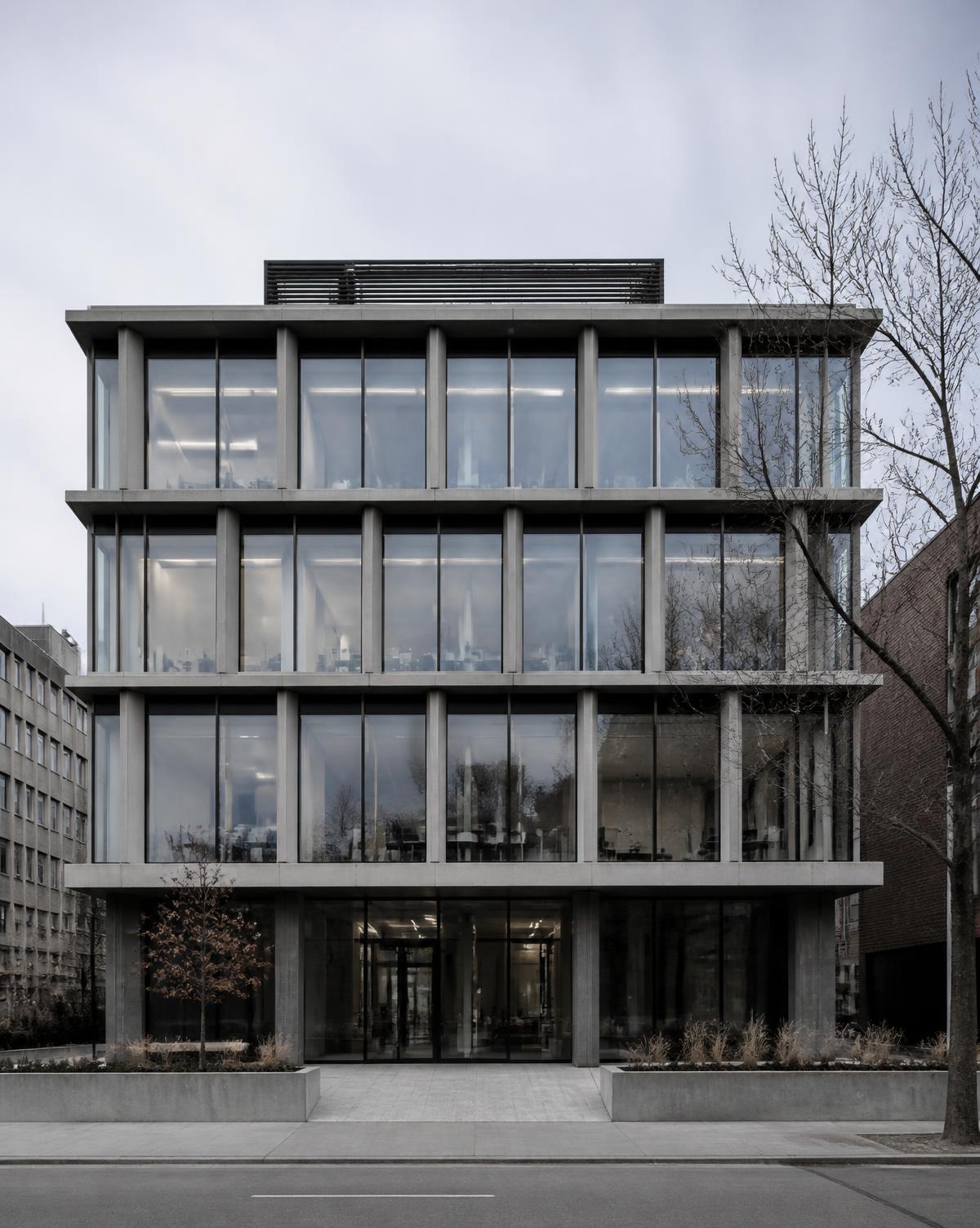 Realisiertes Bürogebäude aus Sichtbeton und Glas, Straßenansicht
